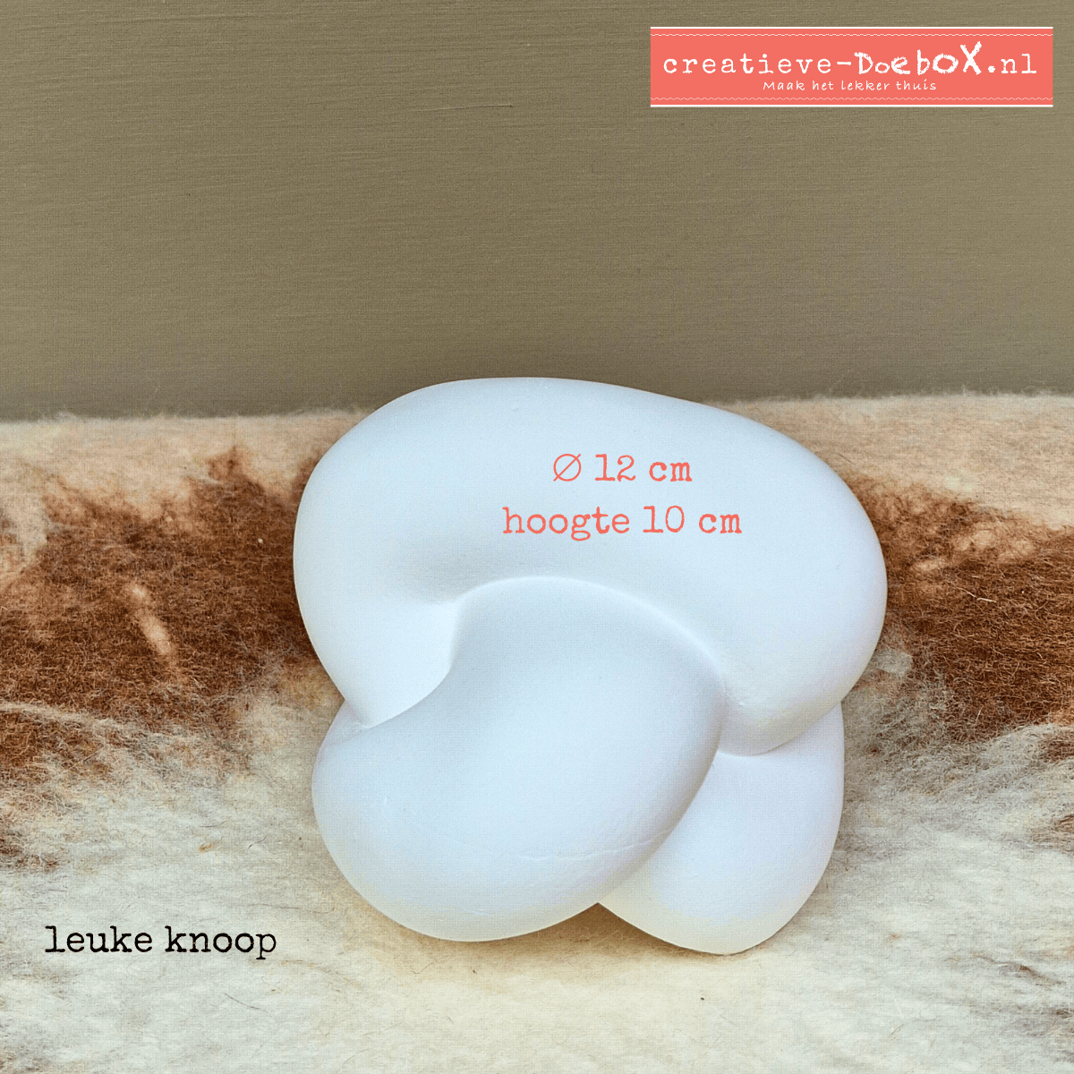 Hoe groot is de knoopvormige presse-papier van keramisch gips?